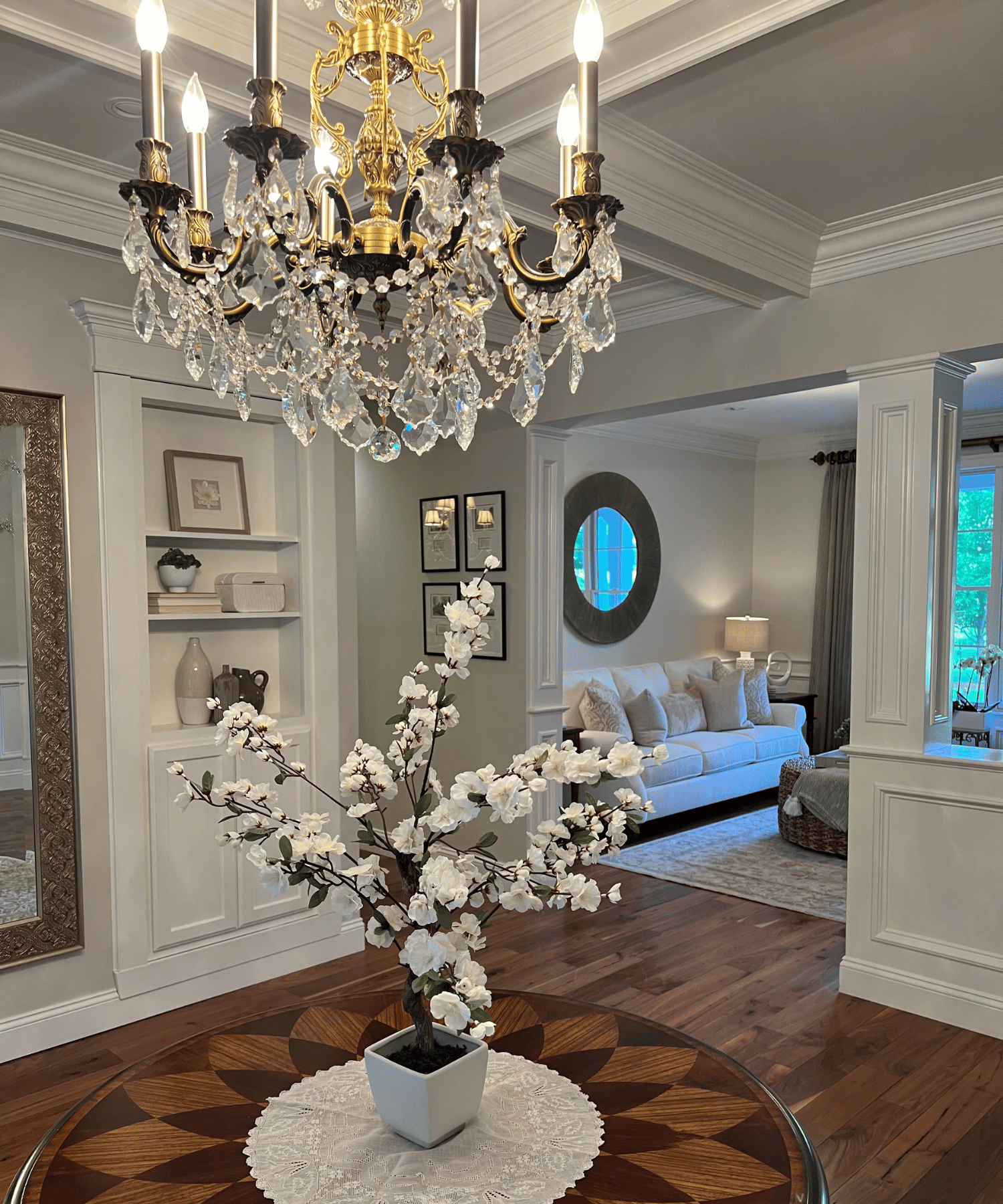 Welcoming foyer featuring a statement chandelier